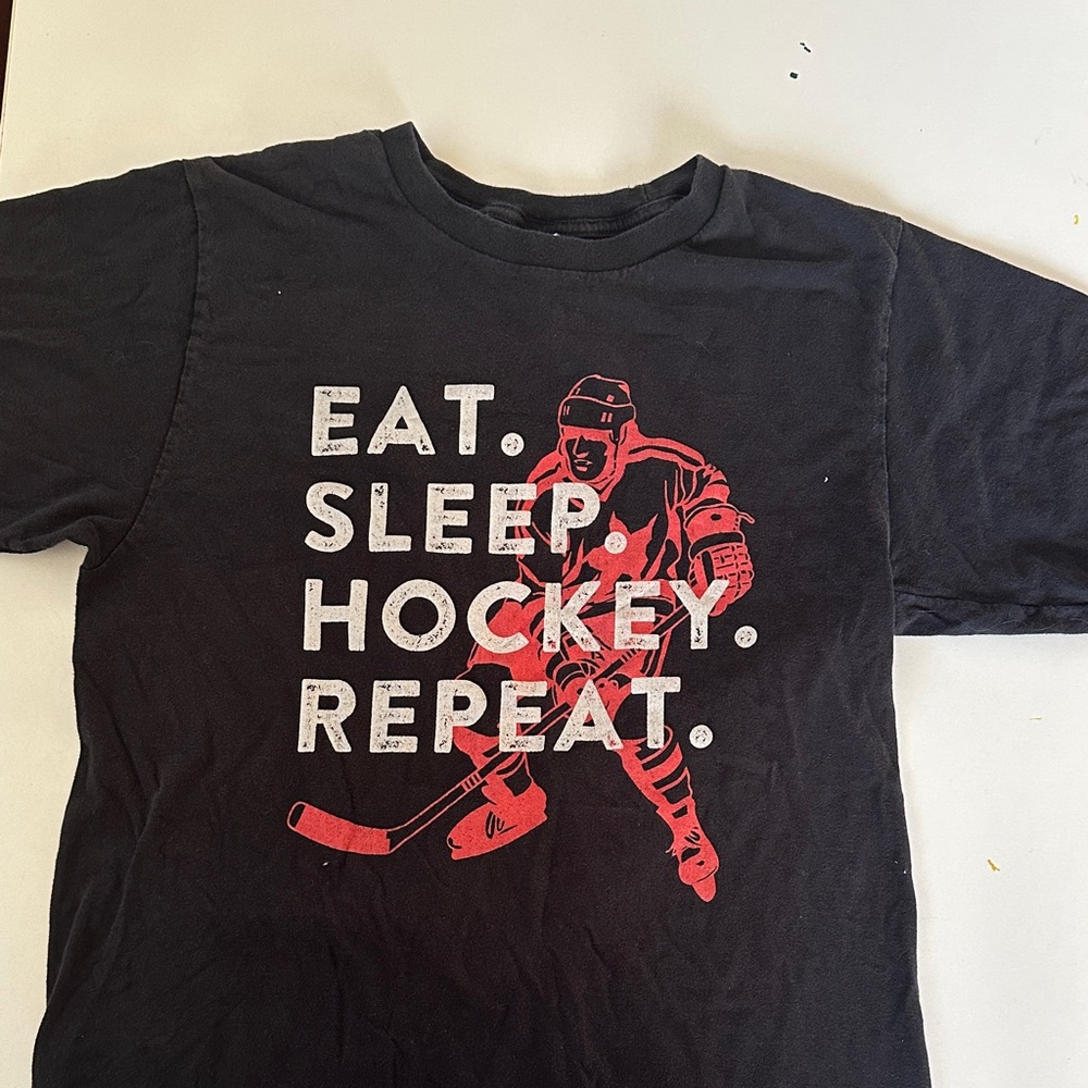 Black T-Shirt with Red Hockey Graphic